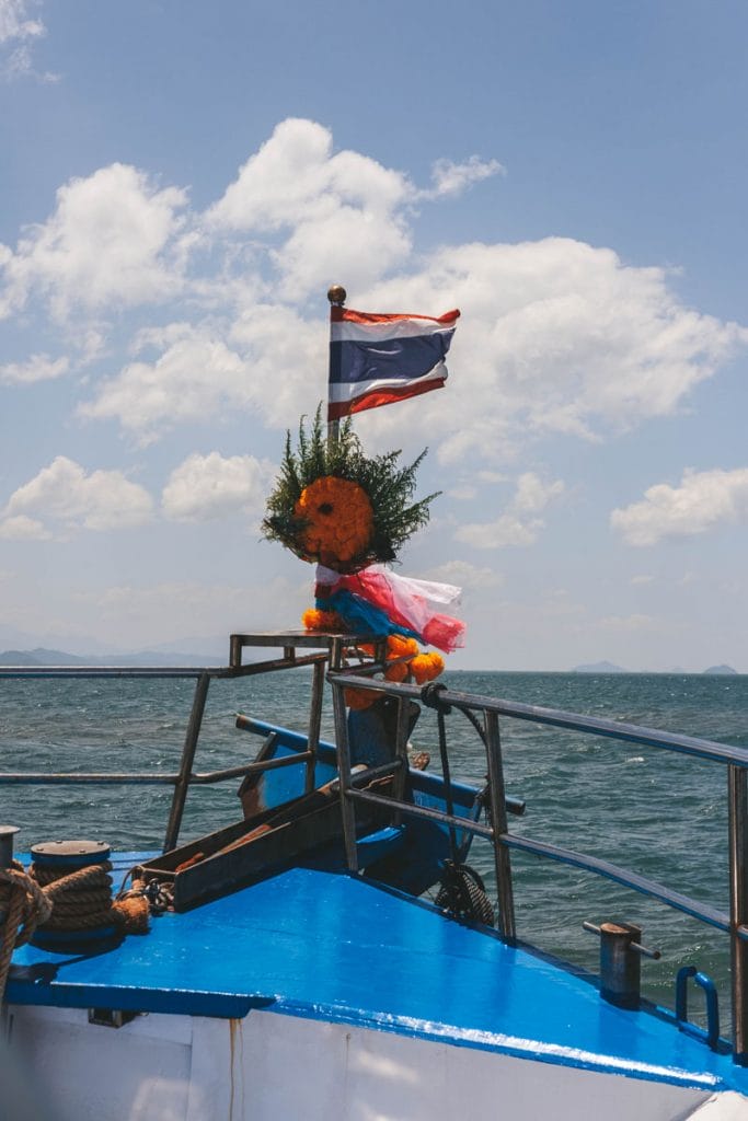 Thai flag and offerings on a liveaboard