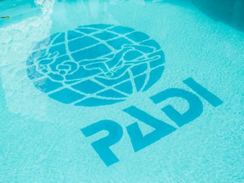 PADI logo on the bottom of a pool