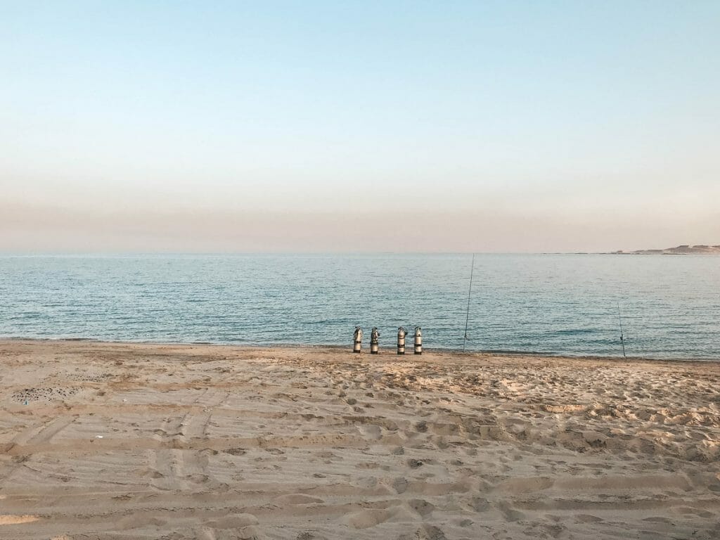 4 scuba tanks by the ocean in Doha