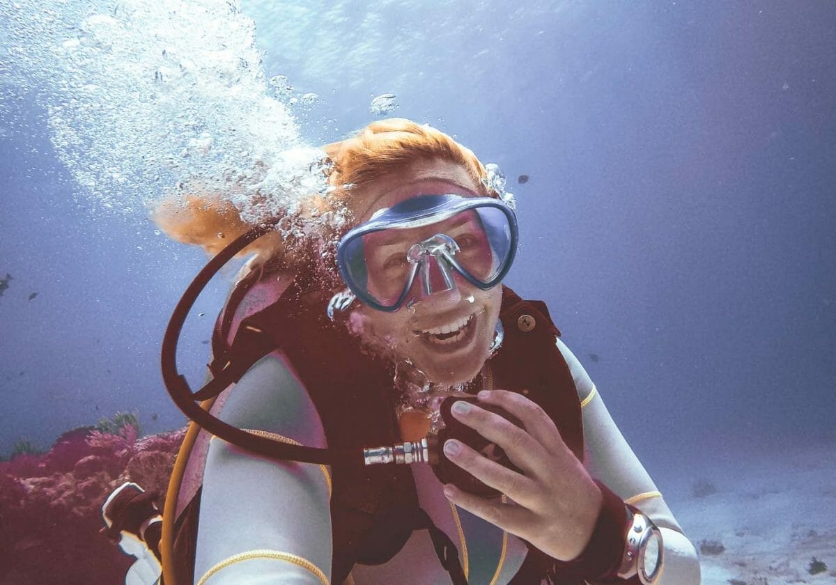 Annika Ziehen smiling underwater in mexico diving