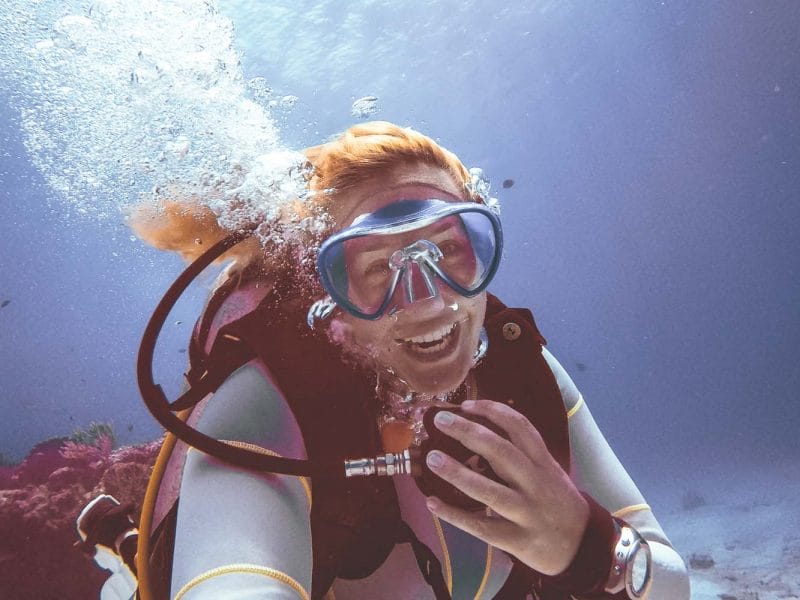 Annika Ziehen smiling underwater in mexico diving