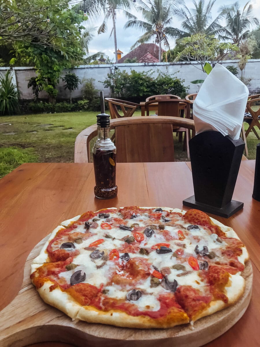 Pizza on a wooden plate