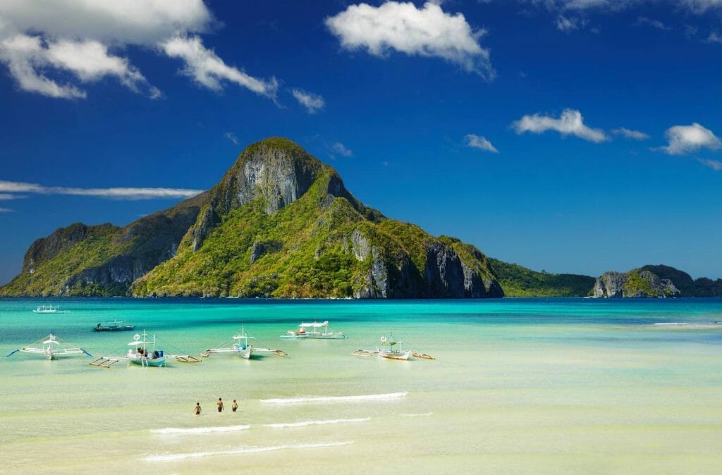 Beach with boats for diving in El Nido, Philippines