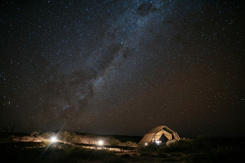 lodge at night with starry sky