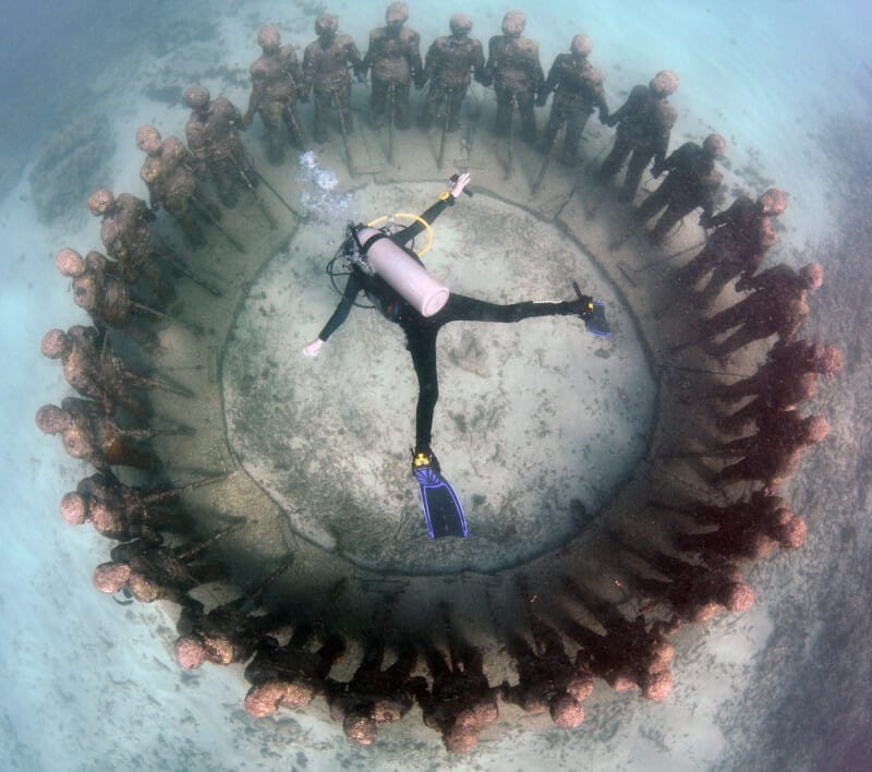 Diver over Underwater Sculpture Park