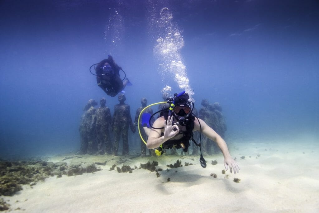 Diver at underwater sculpture park in grenada