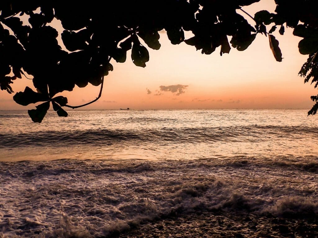 sunrise over the ocean in tulamben beach