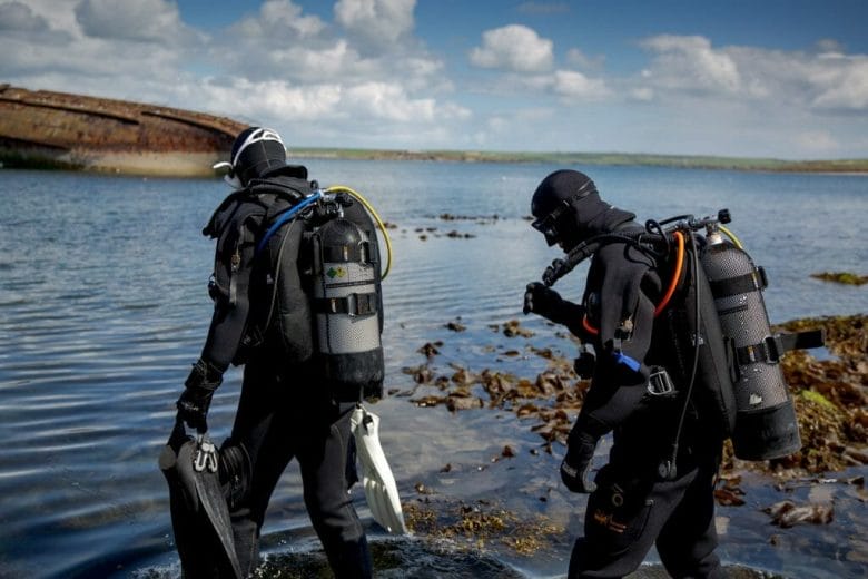 Divers with gear getting ready to dive scapa flow