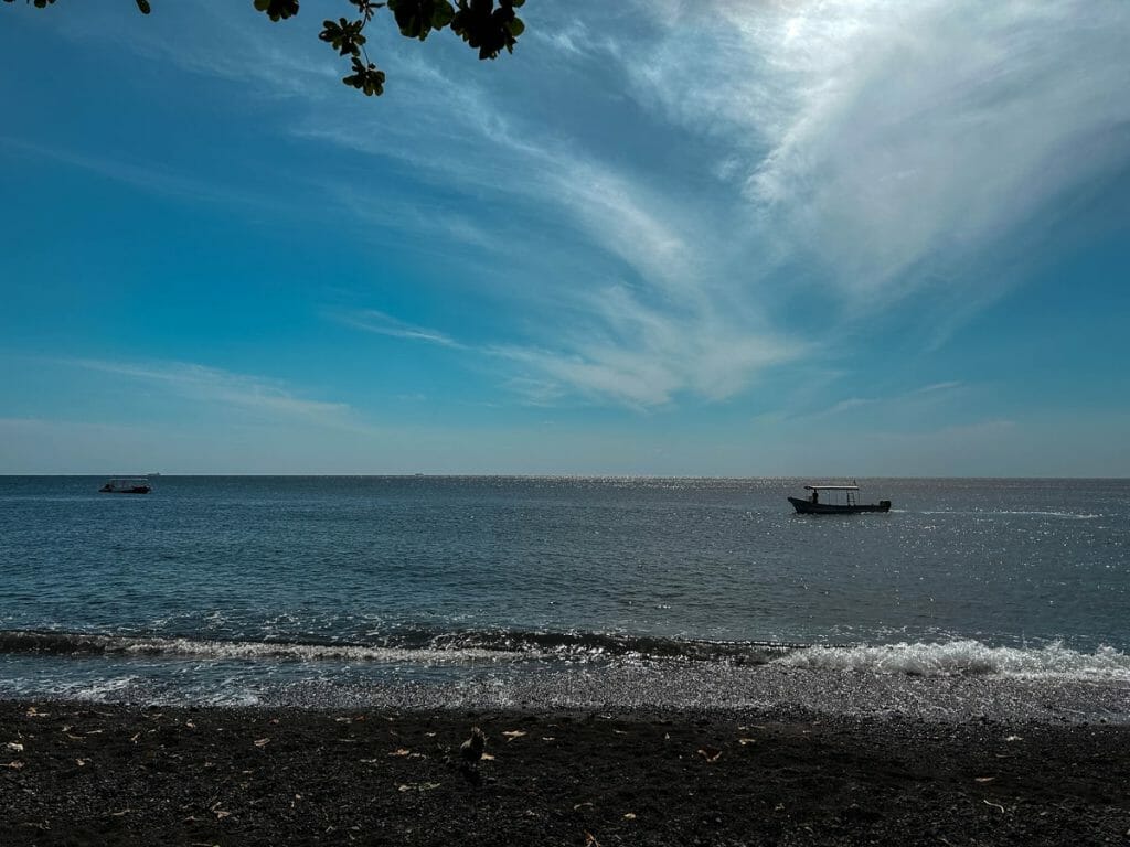 Jemeluk Bay in Amed with boat in the ocean