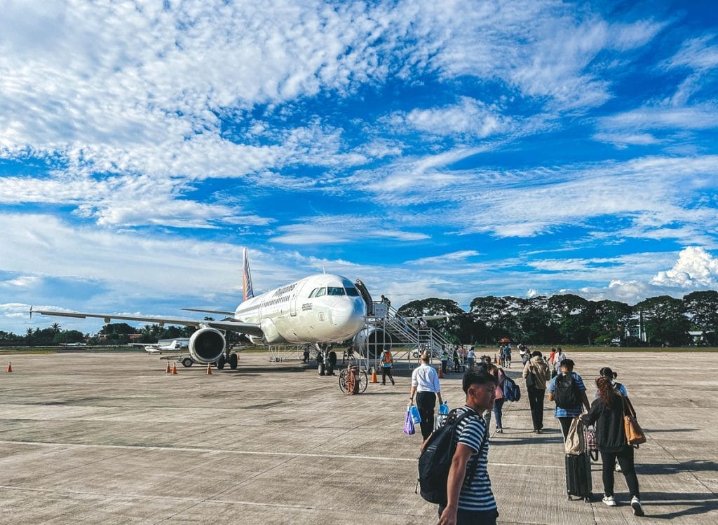 people boarding plane in Dumaguete